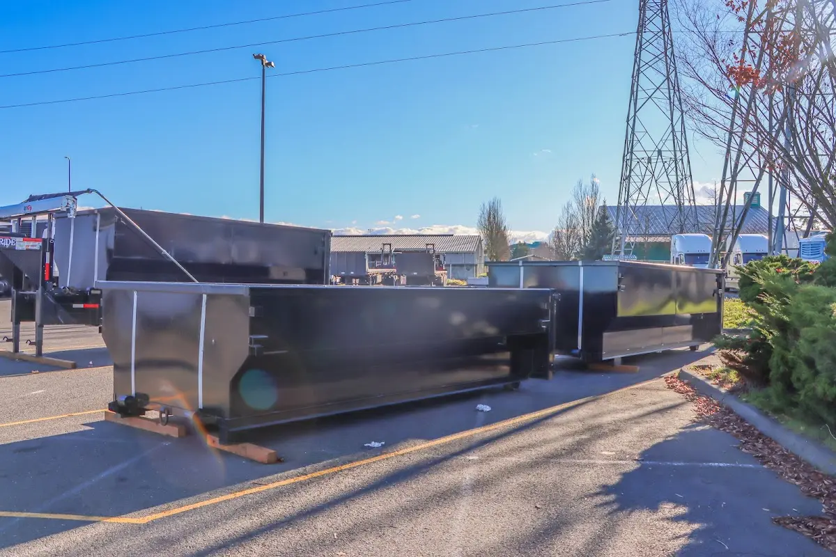 Roll-off dumpster ready for waste disposal at job site for Construction Dumpster Rental in Lake Jackson